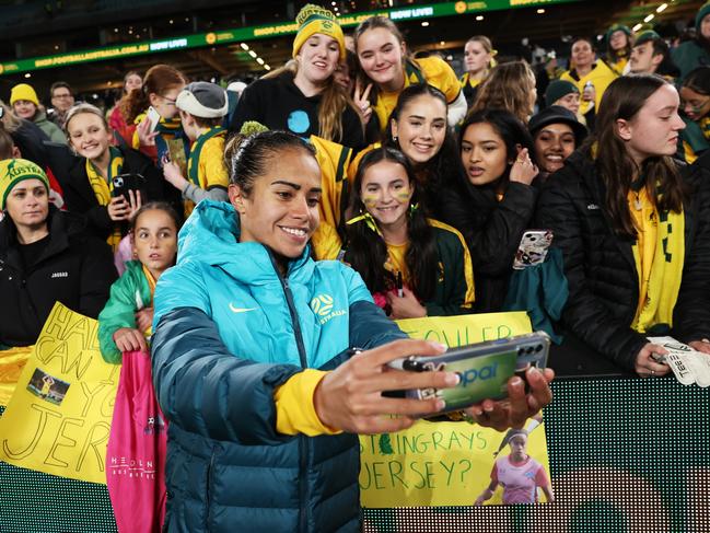 Mary Fowler snaps a picture with Matildas fans. Picture: Getty