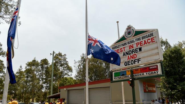 A memorial message for firefighters Andrew O'Dwyer and Geoffrey Keaton is seen on signage at the Horsley Park Rural Fire Brigade. Picture: Bianca De Marchi