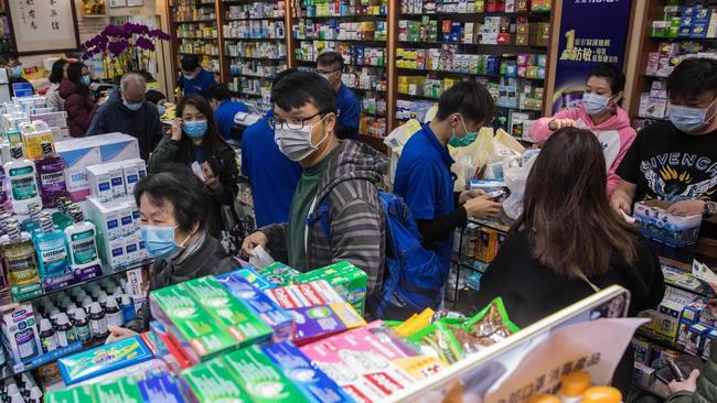 People rush to buy masks in Hong Kong as a preventative measure after a virus outbreak which began in the Chinese city of Wuhan. Picture: AFP