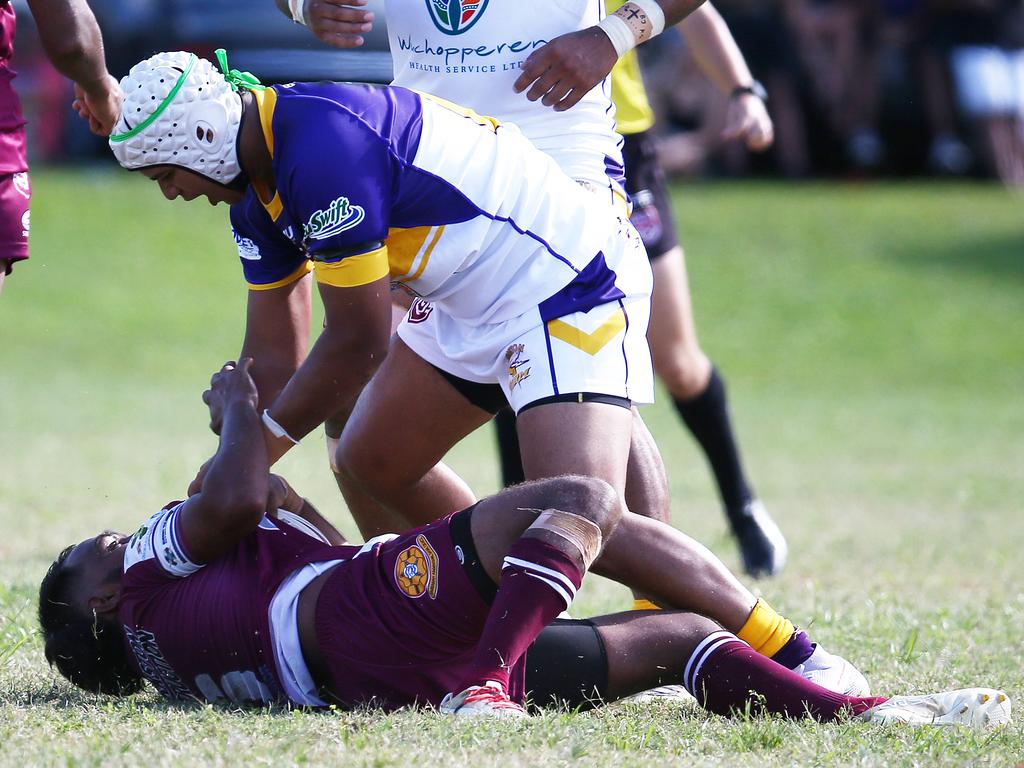 Edmonton's Tyreece Crathern stands over Yarrabah's Coleridge Pabah. Picture: Brendan Radke