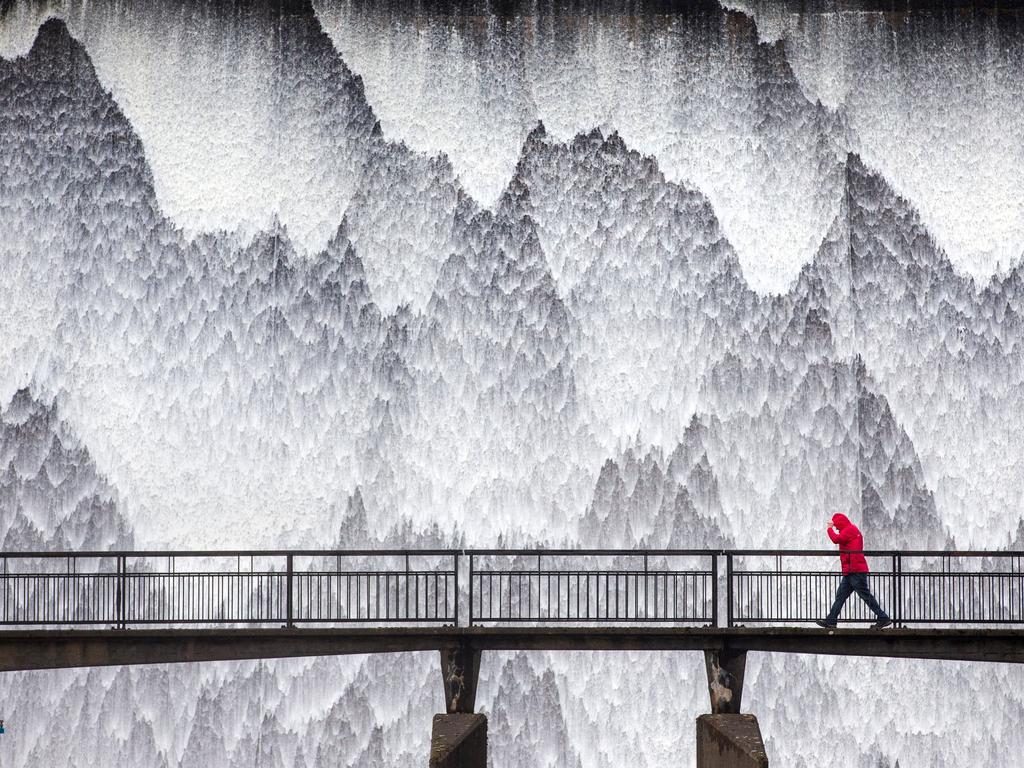 Water streams down the side of the Wet Sleddale Dam in the UK. Picture: Andrew McCaren/Royal Meteorological Society/Media Drum/Australscope