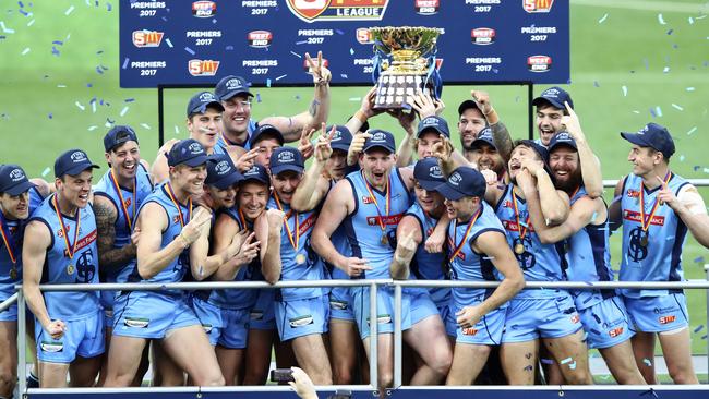 Sturt players celebrate going back to back as premiers in September. Picture: Sarah Reed