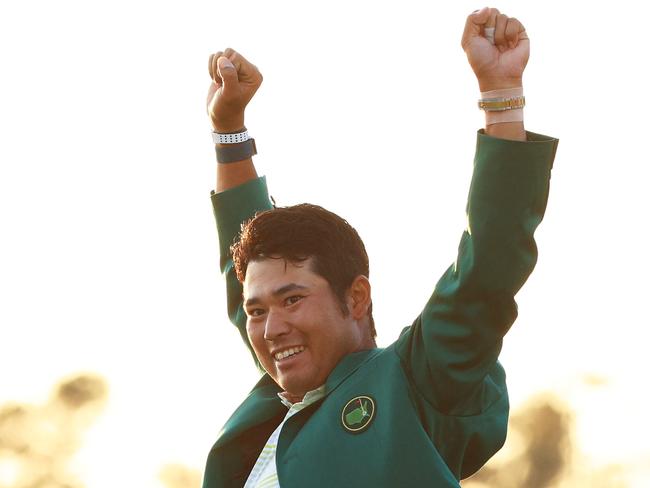 AUGUSTA, GEORGIA - APRIL 11: Hideki Matsuyama of Japan celebrates during the Green Jacket Ceremony after winning the Masters at Augusta National Golf Club on April 11, 2021 in Augusta, Georgia. (Photo by Mike Ehrmann/Getty Images)