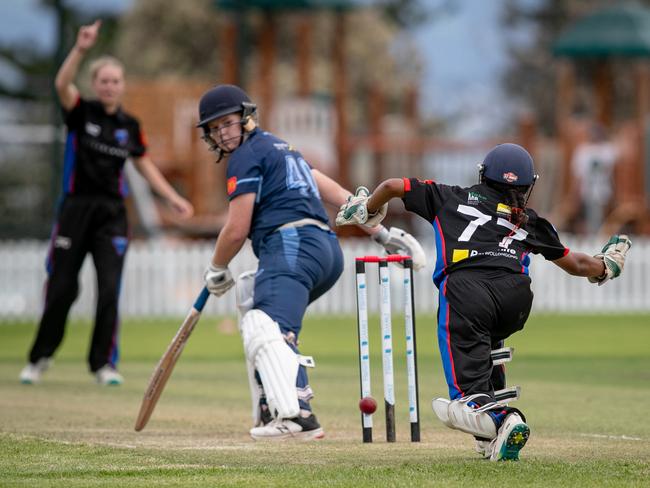 Swans wicketkeeper Reed Kumar tries to run out Manly’s Charlotte Allen. Picture: Julian Andrews