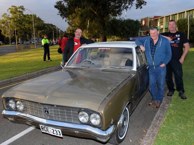 Holden fans with an HG Premier outside the plant. Picture: AAP