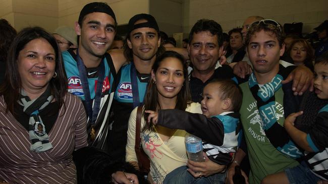 The Burgoyne family in the Port Adelaide change rooms.