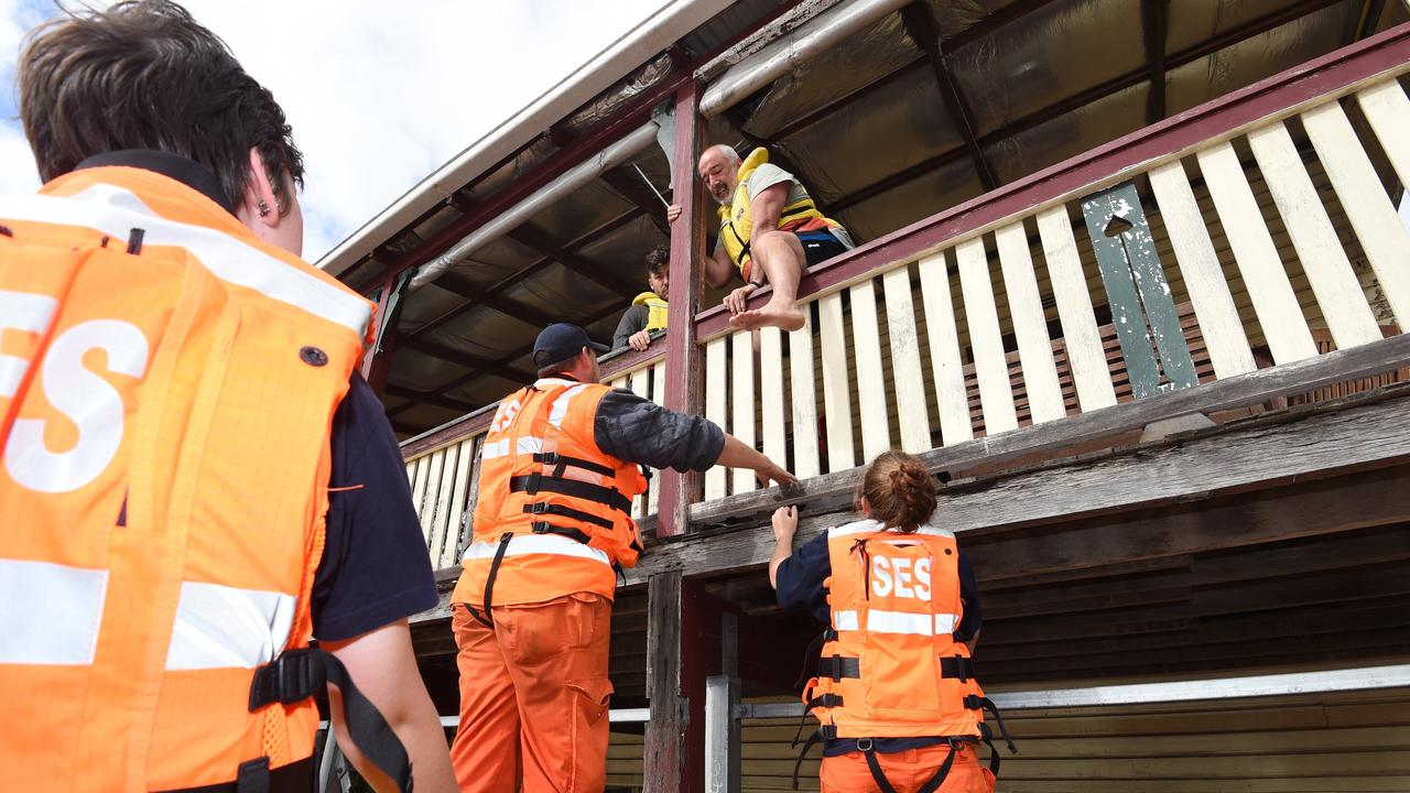 SES crews rescue people who were stranded in the houses in North Lismore.