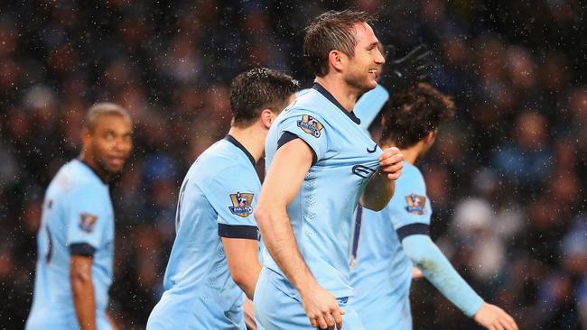 Former Chelsea player Frank Lampard seems comfortable in a Manchester City jersey.