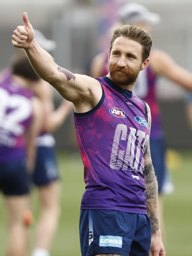 GEELONG, AUSTRALIA - SEPTEMBER 19: Zach Tuohy of the Cats acknowledges the fans during a Geelong Cats AFL training session at GMHBA Stadium on September 19, 2022 in Geelong, Australia. (Photo by Darrian Traynor/Getty Images)