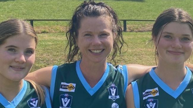 Katherine Towart played a game of footy for the Ammos with daughters Kaylee and Amber. Picture: Katherine Towart.