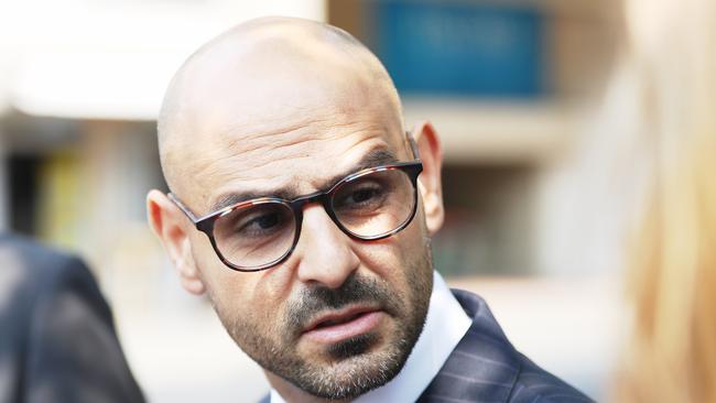 Lawyer Omar Juweinat leaves Parramatta district court after a parole hearing for Milton Orkopolous. Picture John Grainger