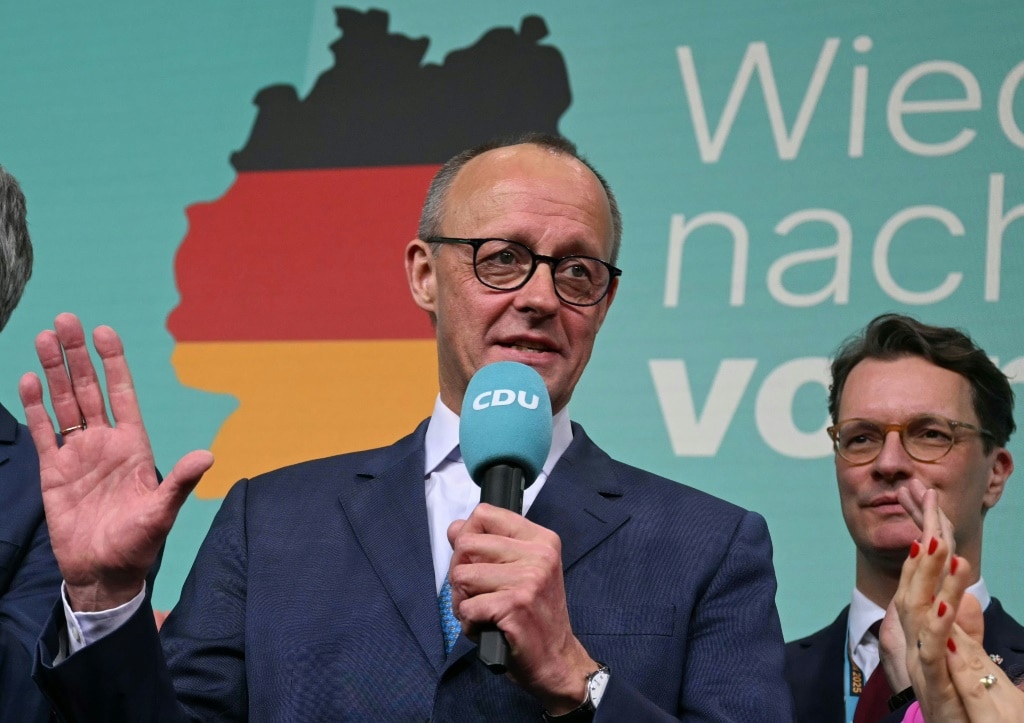 German vote winner Merz seeks to build govt as Europe waits