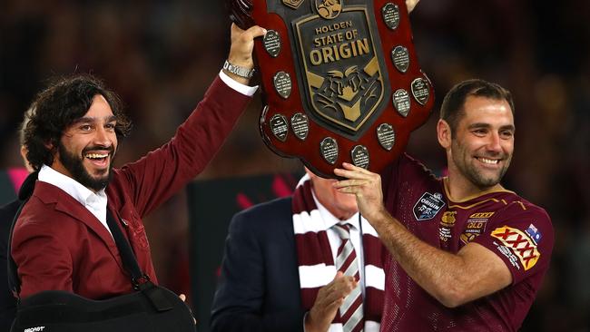 Johnathan Thurston and Cameron Smith hold aloft the Origin trophy. Picture: Getty Images