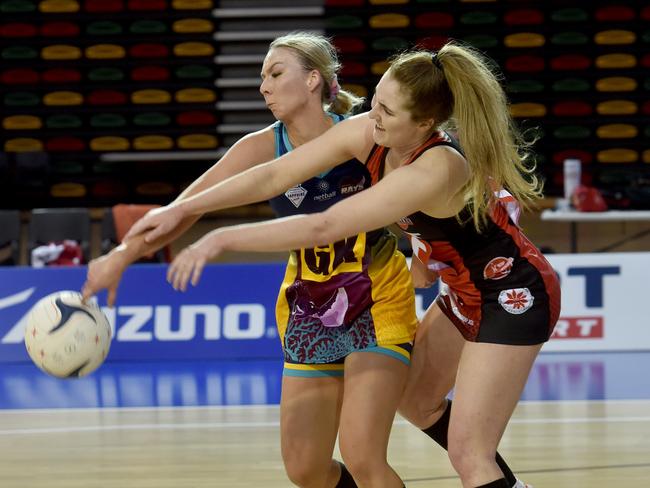 Sapphire Series Netball. Northern Rays against Brisbane North Cougars at Townsville Stadium. Rays Chloe Cooper and Cougars Mia Stower. Picture: Evan Morgan