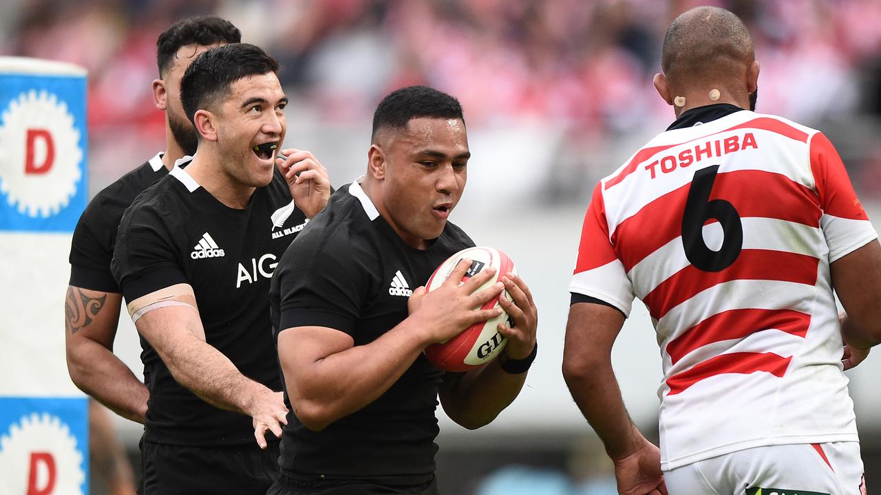 Ngani Laumape of the All Blacks celebrates scoring a try at Tokyo Stadium.