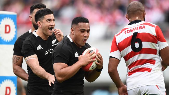 Ngani Laumape of the All Blacks celebrates scoring a try at Tokyo Stadium.