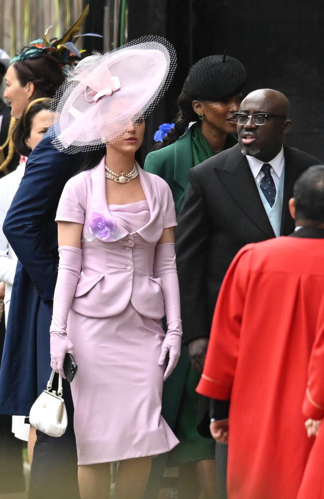 Katy Perry and British Vogue editor Edward Enninful arrive at Westminster Abbey. Picture: Getty Images