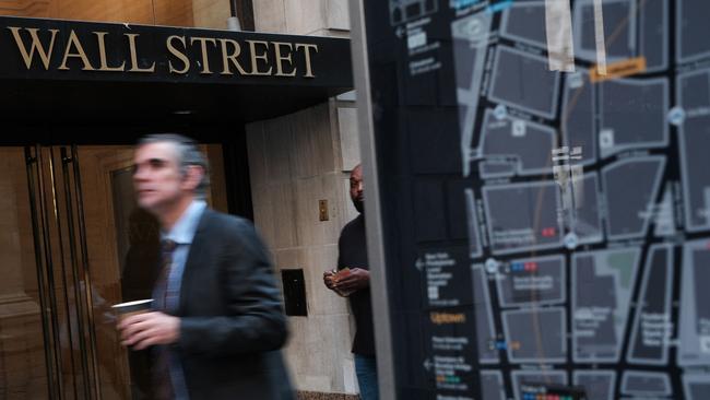 AMP Capital, CBA and HSBC all predict a sharp increase in the chance of a recession in the next 12 months. Picture: AFP