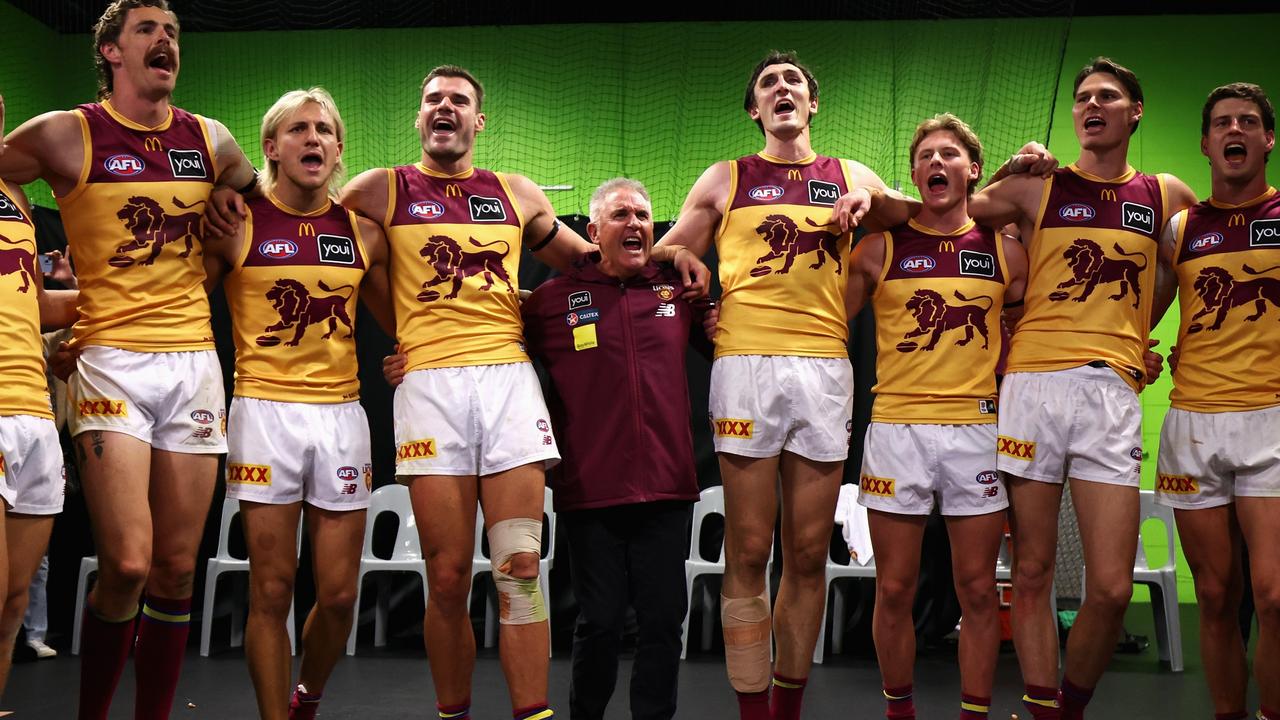 SYDNEY, AUSTRALIA - SEPTEMBER 14: Lions players and Chris Fagan, Senior Coach of the Lions sing their team song after winning the AFL First Semi Final match between GWS Giants and Brisbane Lions at ENGIE Stadium, on September 14, 2024, in Sydney, Australia. (Photo by Cameron Spencer/Getty Images)