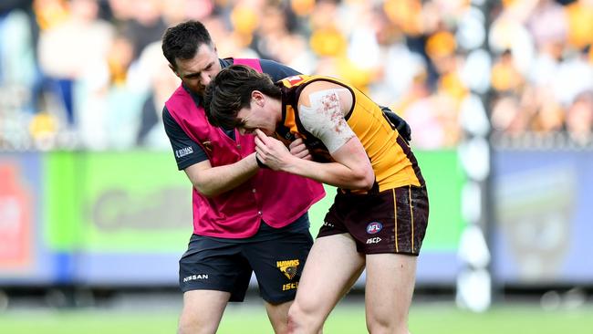 Will Day receives medical attention. Picture: Josh Chadwick/AFL Photos/via Getty Images