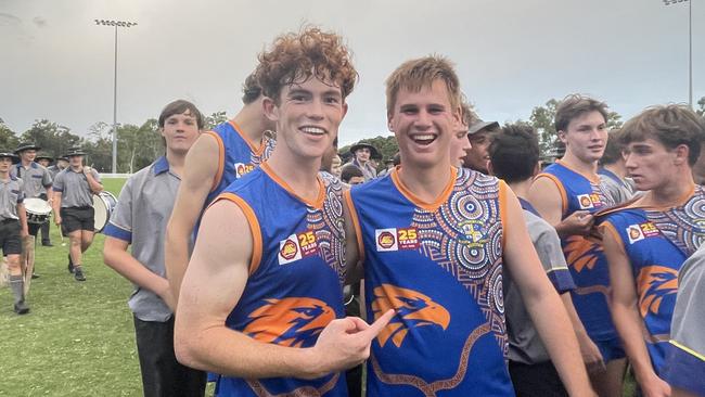 Ashgrove First XVIII afl footy boys after the game (Isaac Roach left and Max Chapman right).