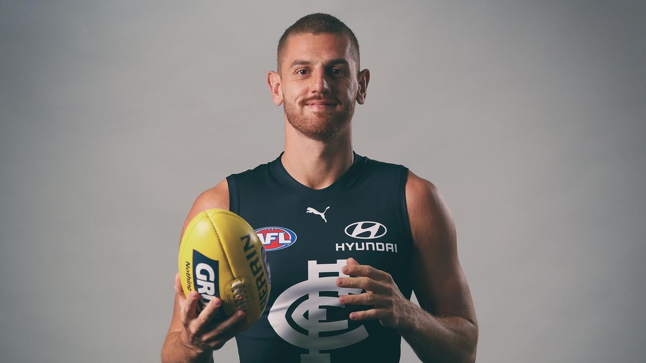 MELBOURNE, AUSTRALIA - FEBRUARY 26: Liam Jones of the Blues poses for a photograph during the Carlton Blues 2021 Official Team Photo Day at Ikon Park on February 26, 2021 in Melbourne, Australia. (Photo by Michael Willson/AFL Photos)