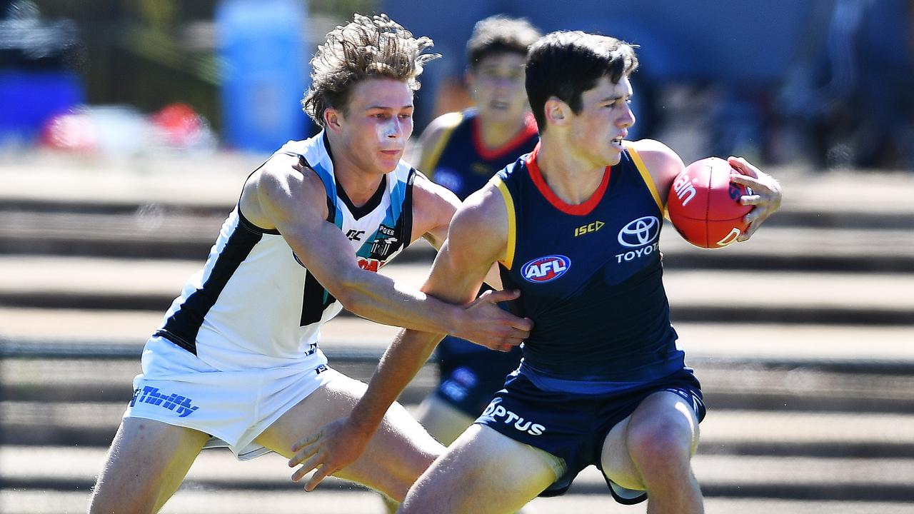 Port rookie Xavier Duursma competes with Crows draftee Chayce Jones in the under-23 trial last weekend. Both will play in Port Pirie. Picture: AAP/Mark Brake