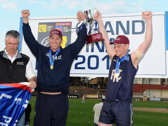 Rosebud coach Nick Jewell and captain Ryan Spooner with the 2015 premiership trophy. Picture: Andrew Henshaw