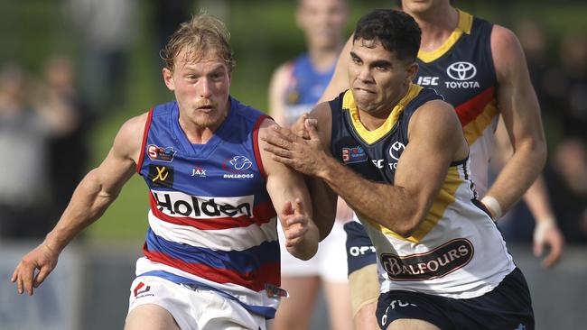 Four-goal Tyson Stengle battles for the ball with Travis Schiller. Picture: AAP Image/Dean Martin