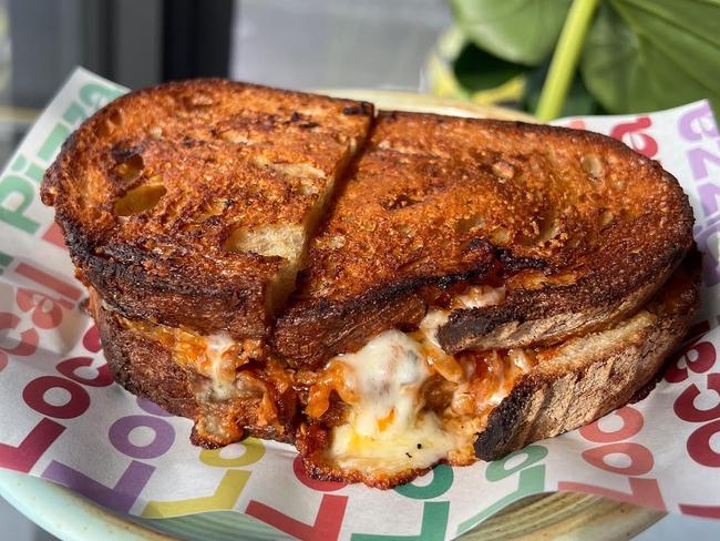 Local Pizza’s Bolognese Toastie, which includes wallaby, pork and eggplant bolognese, plus three cheeses, tangy pickles and onion jam. Picture: Isabella Edwards