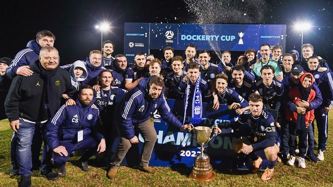 Oakleigh Cannons lift the Dockerty Cup. Picture: Mark Avellino