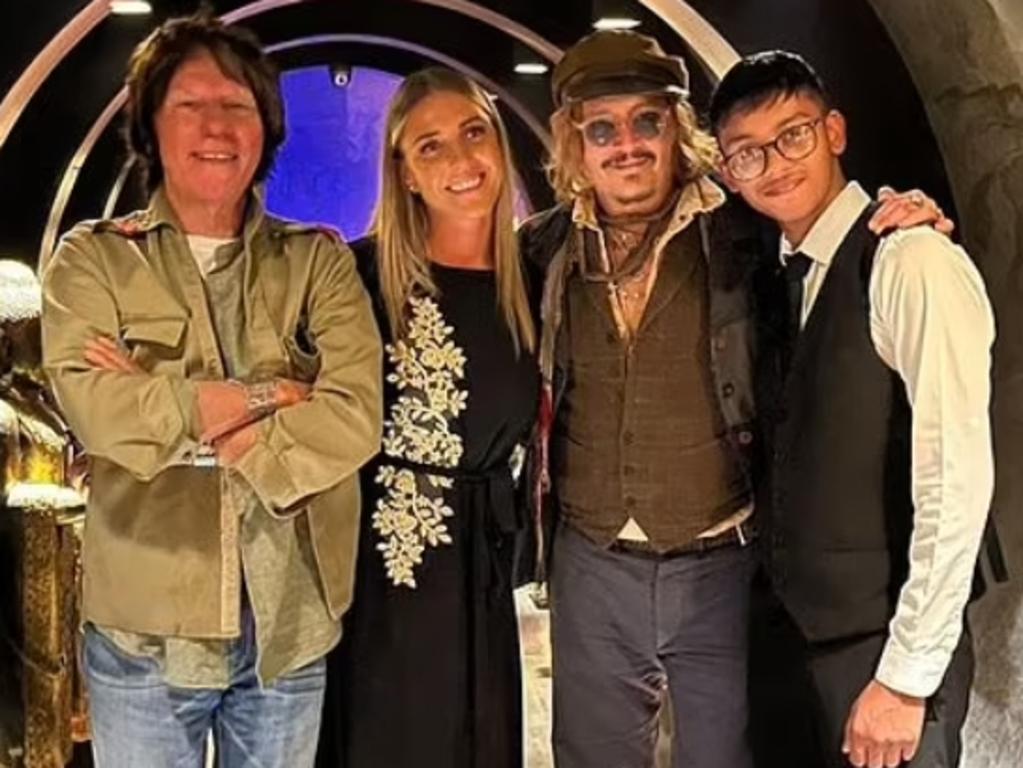 Johnny Depp (third from left), seen here with musician Jeff Beck (far left), spent more than $62,000 for a night out on the town with his pals. Picture: Varanasi Birmingham