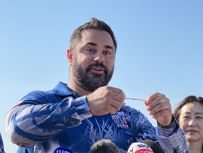 Sportsbet NT Operations and Partnerships Manager Thijs Bors shows off a red tag ahead of Season 10 of the Million Dollar Fish kicking off on October 1, 2024. Picture: Fia Walsh.