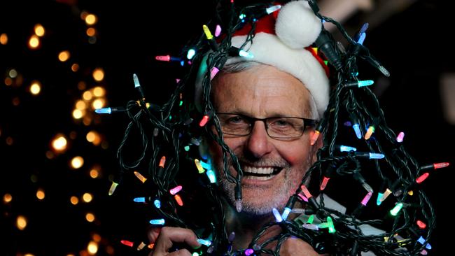 Peter Mangelsdorf with Christmas lights in his shed.