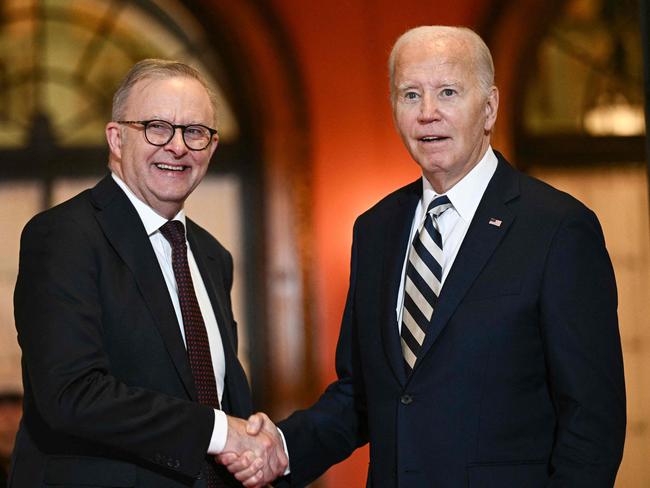 US President Joe Biden bids farewell to Australian Prime Minister Anthony Albanese at the end of the Quadrilateral Summit at the Archmere Academy in Wilmington, Delaware, on September 21, 2024. (Photo by Brendan SMIALOWSKI / AFP)