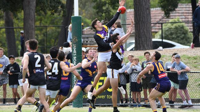 Tristan Tweedie lunges for a mark against Vermont in 2019. Picture: Field of View