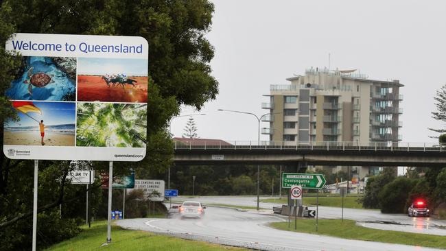 A Queensland Police car sits on the border of NSW and Queensland. Photo: Scott Powick Newscorp Australia