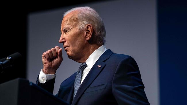 Joe Biden clears his throat speaking this week in Las Vegas. He left the city on Wednesday to isolate in Delaware after catching Covid-19. Picture: Kent Nishimura / AFP