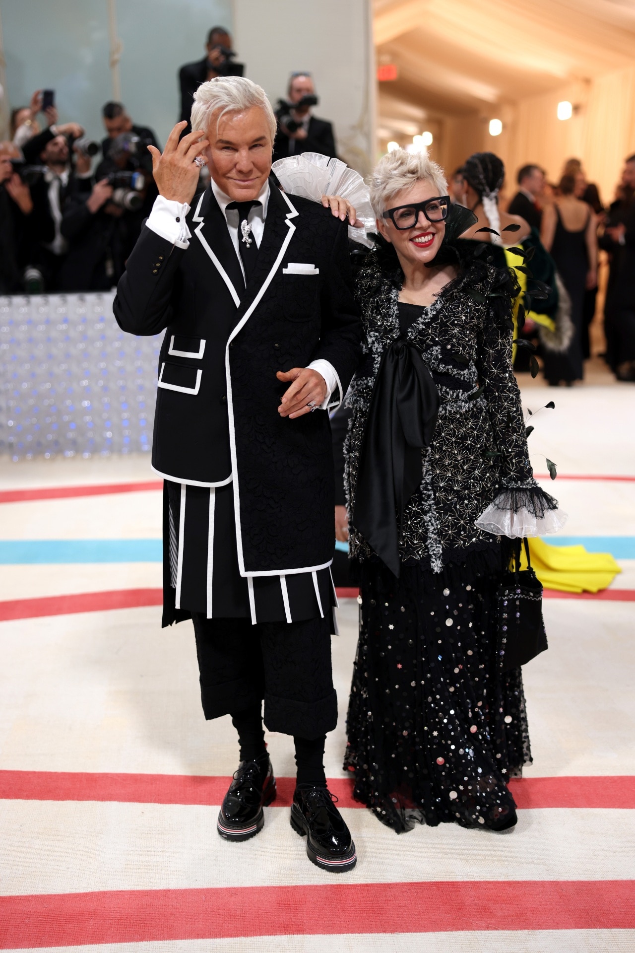 <h2>Catherine Martin in Romance was Born at the 2023 Met Gala</h2><p><em><strong>Theme</strong>: Karl Lagerfeld: A Line of Beauty</em></p><p>Oscar-winning costume designer Catherine Martin is a regular on the Met Gala red carpet, and this year, in homage to the work of German designer Karl Lagerfeld, she stepped out in a glittering caped dress by Australian label Romance Was Born. Its monochrome colourway and fluted sleeves nod to his decades spent at Chanel, but is infused with Romance's trademark artistic goth glamour edge.  </p><p>&nbsp;</p>