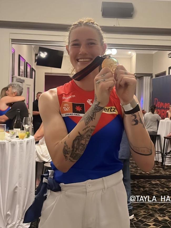 Tayla Harris was all smiles after winning the AFLW grand final at the fourth attempt.