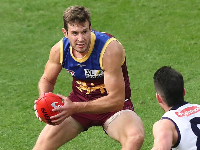 BRISBANE, AUSTRALIA - JUNE 13: Grant Birchall of the Lions in action during the round 2 AFL match between the Brisbane Lions and the Fremantle Dockers at The Gabba on June 13, 2020 in Brisbane, Australia. (Photo by Jono Searle/AFL Photos/Getty Images)