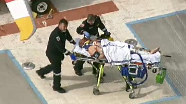 A man was taken to Royal Melbourne Hospital via air ambulance.