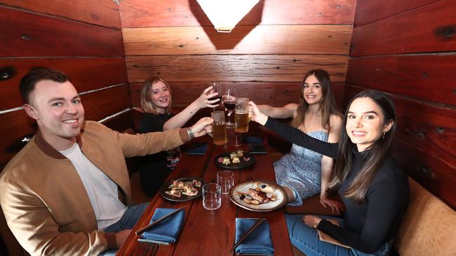 Connor Hewitt, Maddison Farmer, Maria Trotta and Juliet Trotta enjoying a night out at IKU in Burleigh. Photograph: Jason O'Brien