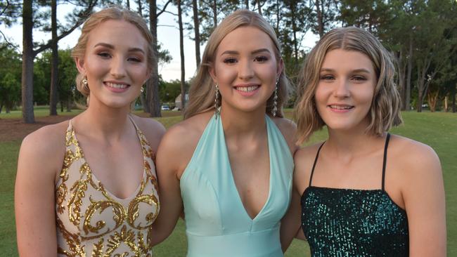 Mackenzie Smyth, Lara Feenaghty and Courtney Calvert at the Pioneer State High School formal at the Mackay Golf Course on Friday November 20. Picture: Zizi Averill