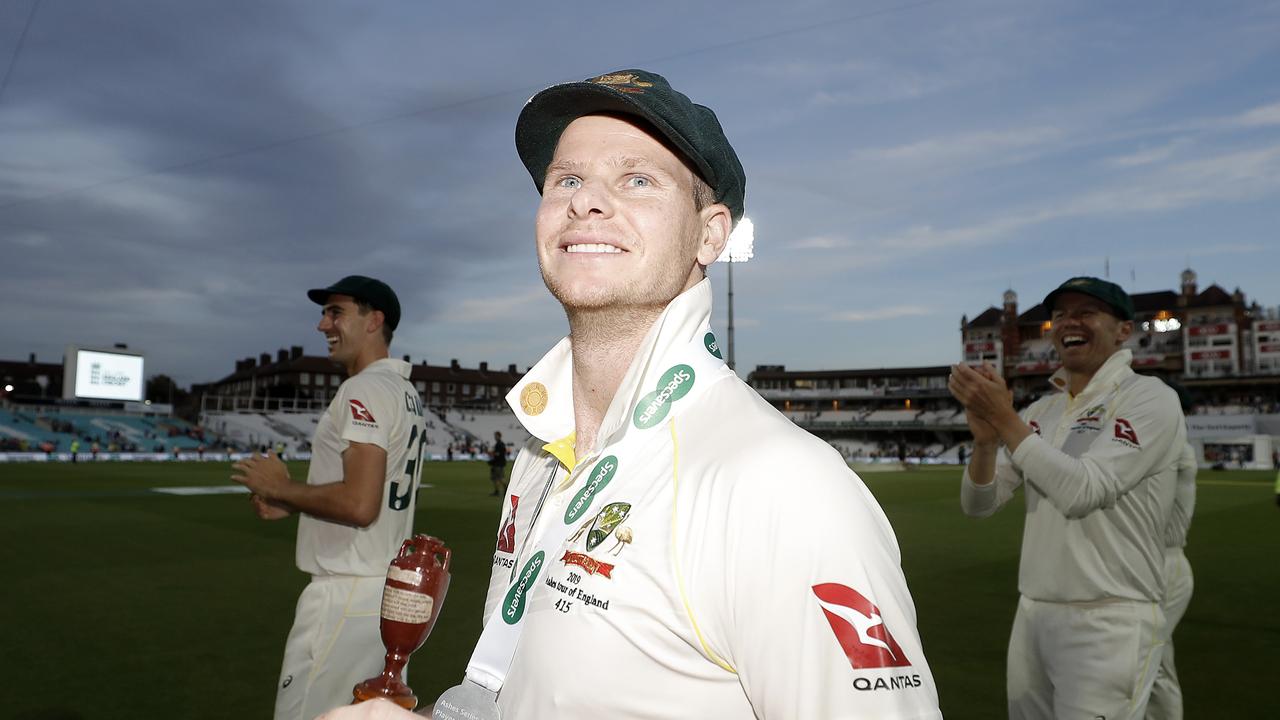 Steve Smith of Australia celebrates with the Urn after Australian drew the series to retain the Ashes.