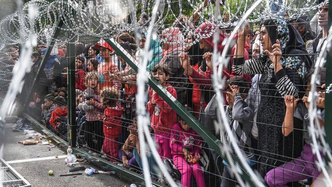 Refugees on the Hungary-Serbia border in 2015.