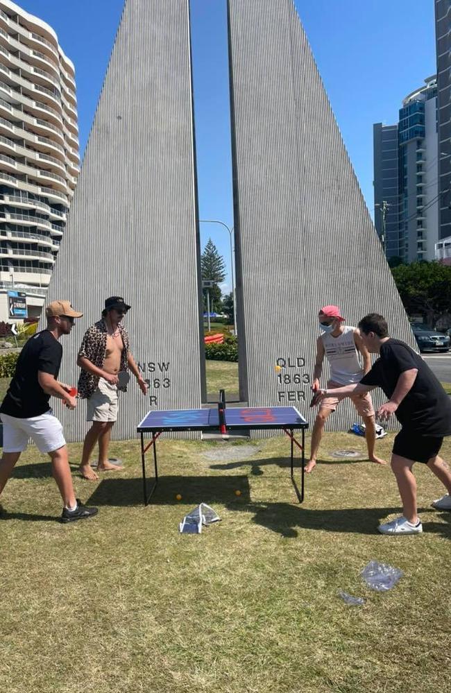 A group of mates takes to the border for a friendly game of table tennis.