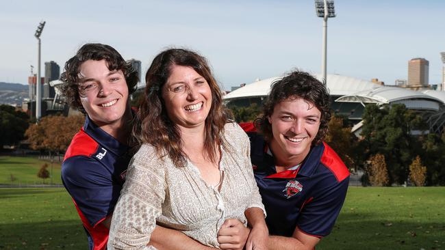 Redbacks’ Thomas and Corey Kelly give mum Tina a hug for Mother’s Day. Picture: Sarah Reed