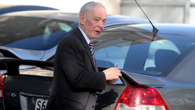 Bob Day leaving his office in Kent Town. Picture: KELLY BARNES