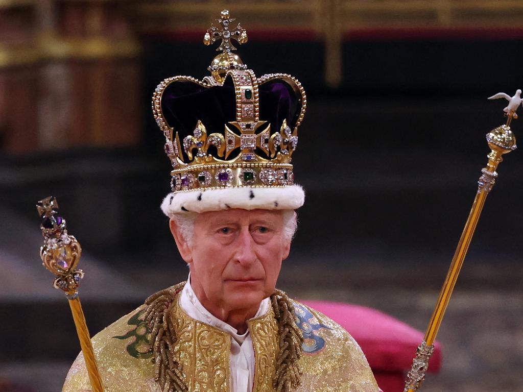 King Charles walks wearing St Edward’s Crown during the coronation ceremony inside Westminster Abbey. Picture: Richard Pohle / AFP